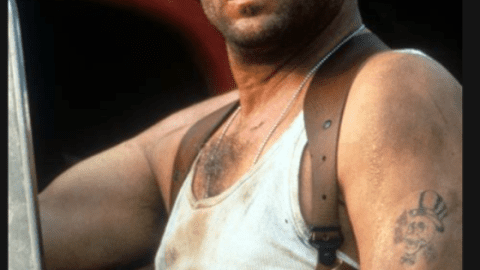 An image of Bruce Willis as John McLane from Die Hard, a reluctant hero character